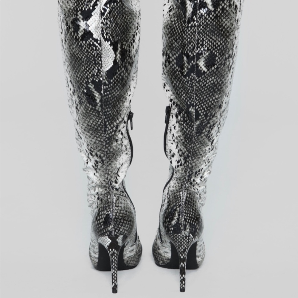 Thigh high snake boots